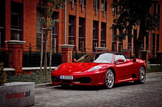 Red sports car brick street free wallpaper for desktop - medium preview image