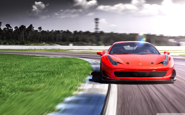 Red sports car track grass free wallpaper for desktop - medium preview image