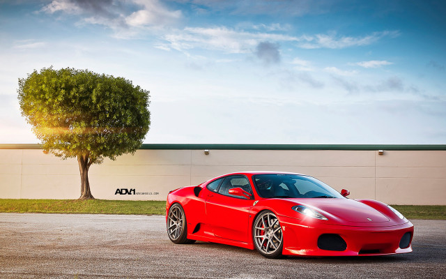 Red sports car parking lot #65 free wallpaper for desktop - medium preview image