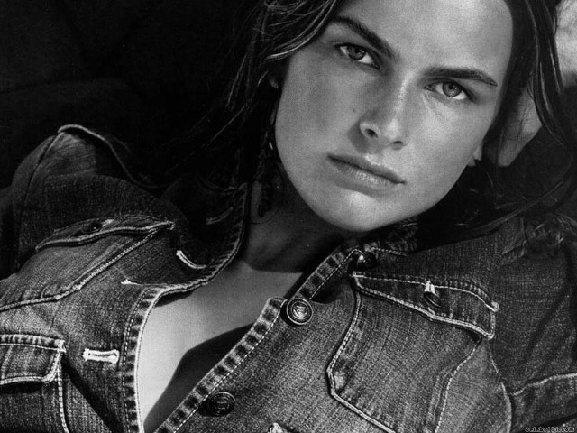 Woman jean jacket ponytail earrings free wallpaper for desktop - medium preview image