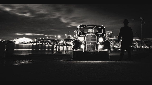 Man car pier night city free wallpaper for desktop - medium preview image