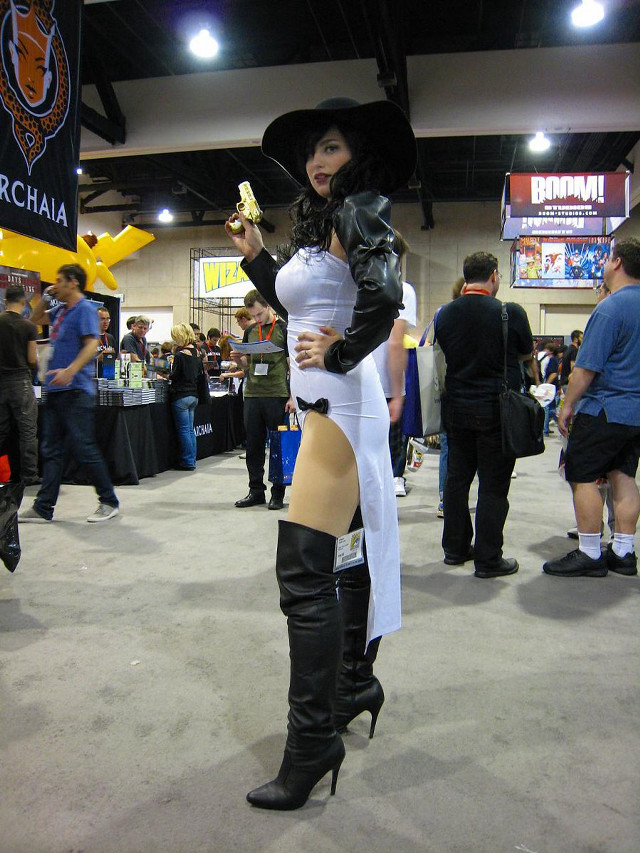 Woman costume boots convention crowd free wallpaper for mobile - medium preview image