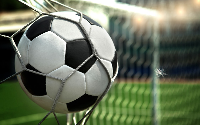 Soccer ball stuck net field free wallpaper for desktop - medium preview image
