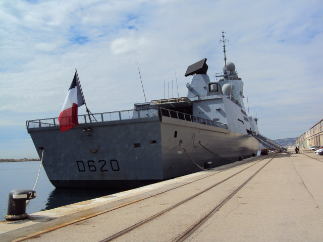 Large boat docked flag mast free wallpaper for desktop - medium preview image