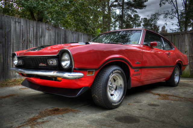 Red car parked driveway wooden free wallpaper for desktop - medium preview image