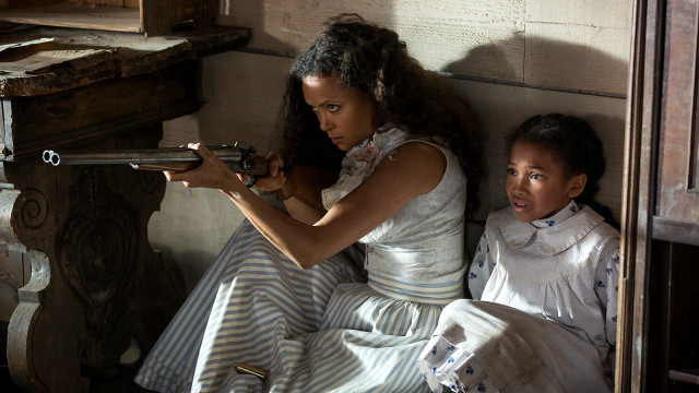 Afrofuturism women child gun sitting free wallpaper for desktop - medium preview image