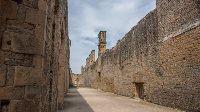 Narrow street stone wall clock free wallpaper for desktop - medium preview image