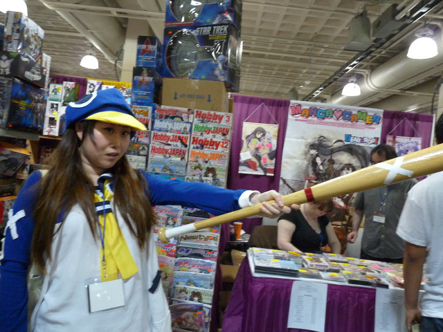 Woman holding baseball bat store free wallpaper for desktop - medium preview image