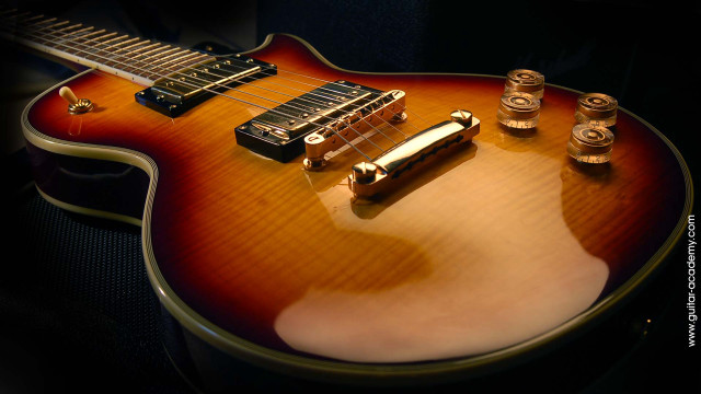 Guitar brown body gold neck free wallpaper for desktop - medium preview image