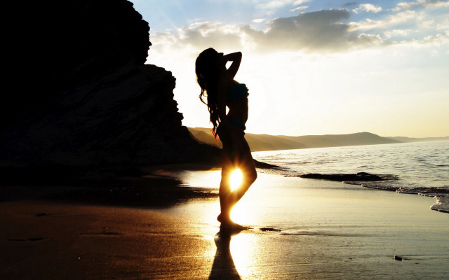 Woman beach ocean sunset sunlight free wallpaper for desktop - medium preview image