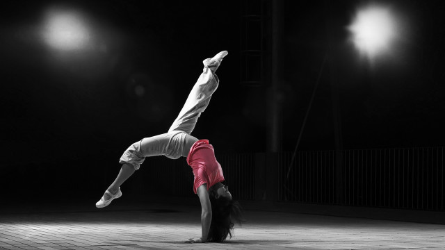 Handstand brick floor dark room free wallpaper for desktop - medium preview image