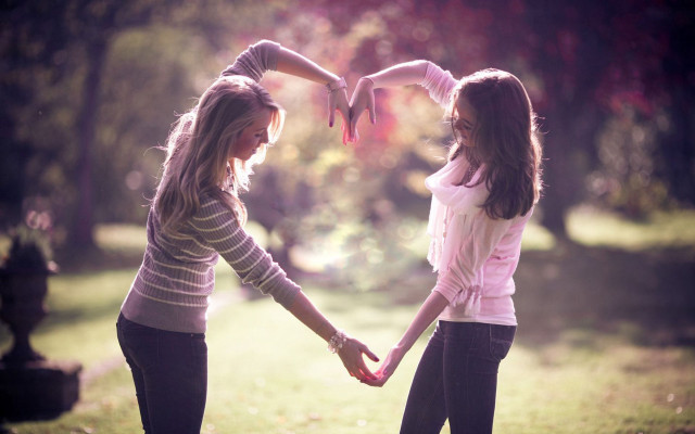 Two girls holding hands park free wallpaper for desktop - medium preview image