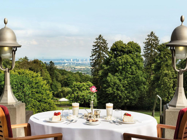 Table chairs white tablecloth city free wallpaper for desktop - medium preview image