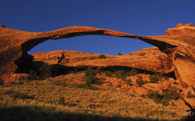 Large rock arch autumn forest free wallpaper for desktop - medium preview image