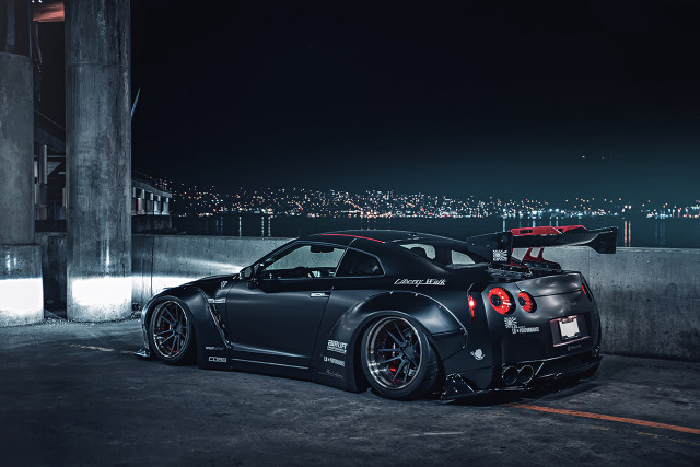 Black sports car parking lot #29 free wallpaper for desktop - medium preview image