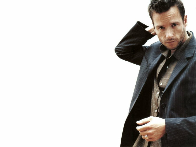 Man suit tie hand ear #2 free wallpaper for desktop - medium preview image