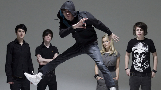 Man jumping arms out between free wallpaper for desktop - medium preview image