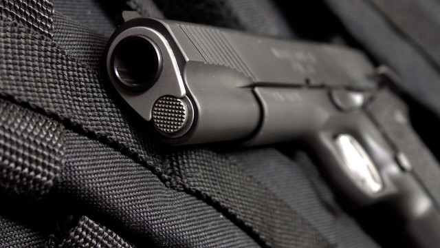 Gun backpack black handle side free wallpaper for desktop - medium preview image