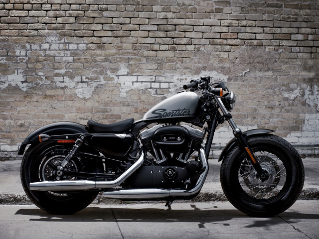 Black motorcycle brick wall building #2 free wallpaper for desktop - medium preview image