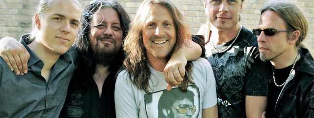 Men group brick wall standing free wallpaper for desktop - medium preview image