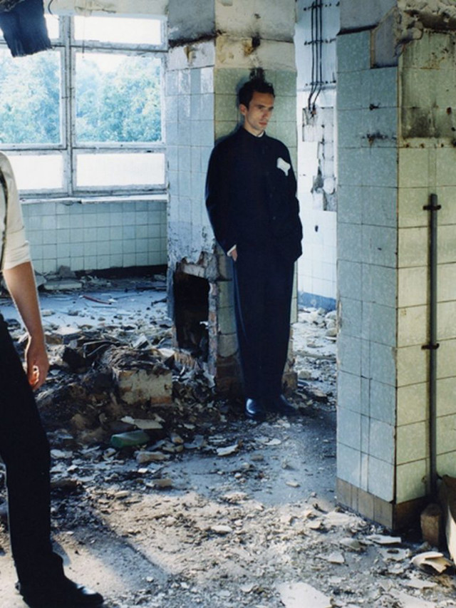 Man standing room tv middle free wallpaper for mobile - medium preview image