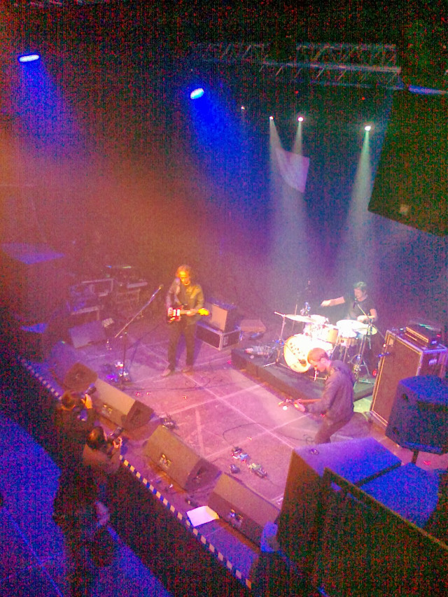 Band blue lights microphone man free wallpaper for mobile - medium preview image