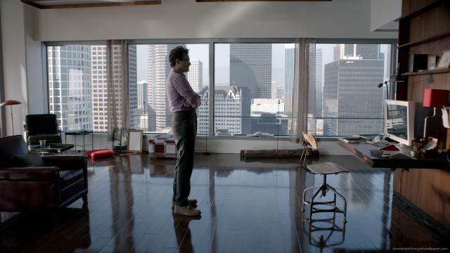 Man standing living room window free wallpaper for desktop - medium preview image