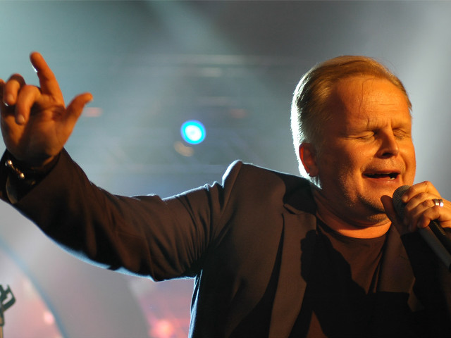 Man microphone hand holding dual free wallpaper for desktop - medium preview image