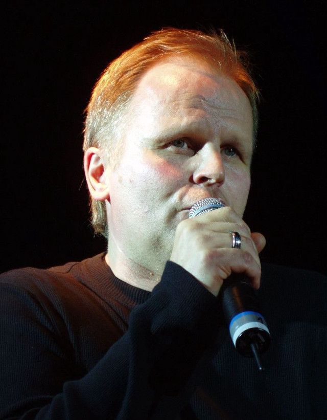 Man microphone black shirt looking free wallpaper for mobile - medium preview image