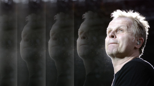 Man shaved head looking up free wallpaper for desktop - medium preview image