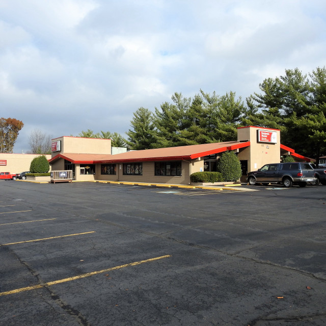 Motel parking lot trees cloudy free wallpaper for tablet - medium preview image