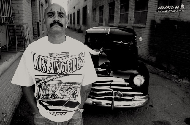 Man standing car alley mustache free wallpaper for desktop - medium preview image