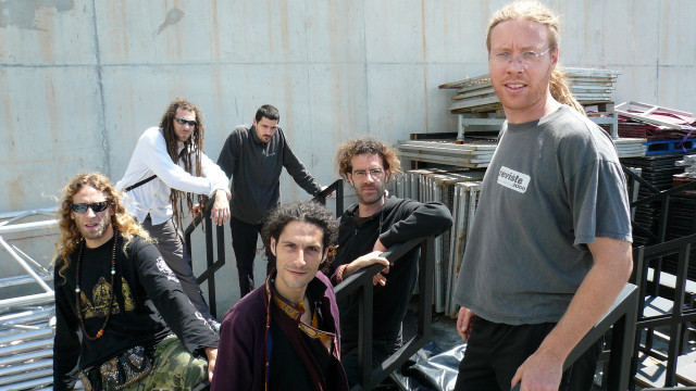 Men group building fence standing free wallpaper for desktop - medium preview image