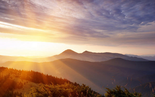 Sunset mountain range trees crepuscular free wallpaper for desktop - medium preview image