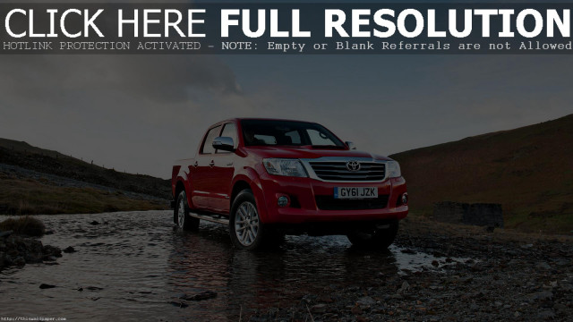 Red truck driving river hill free wallpaper for desktop - medium preview image