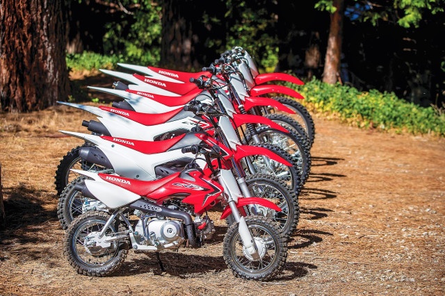 Dirt bikes parked dirt road free wallpaper for desktop - medium preview image