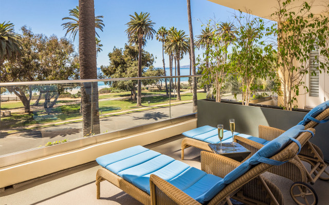 Balcony chairs table beach view free wallpaper for desktop - medium preview image