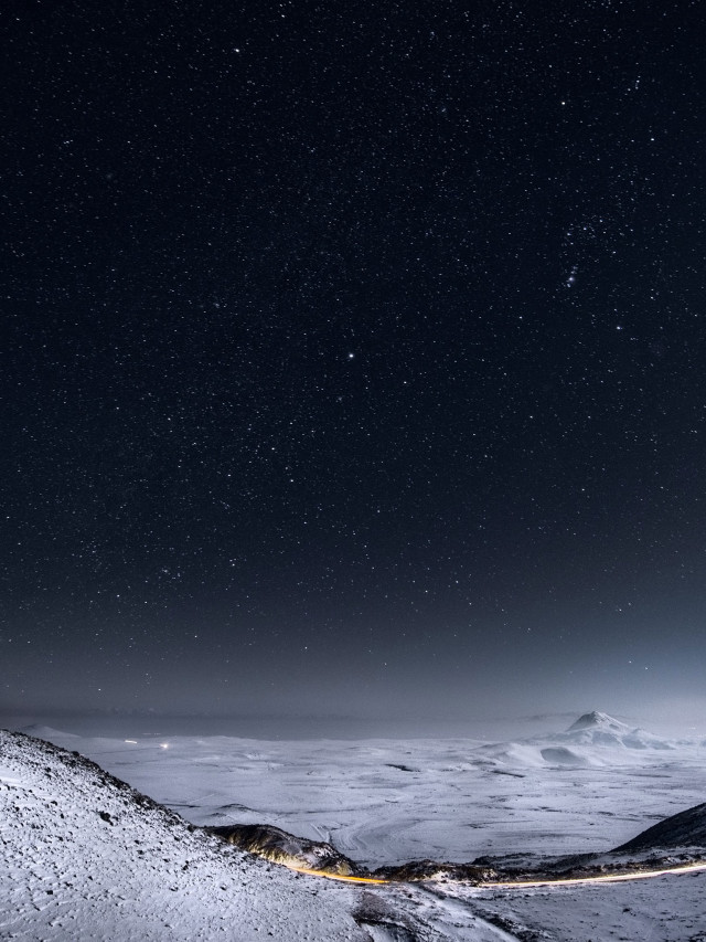 Snowy mountain road night sky free wallpaper for mobile - medium preview image