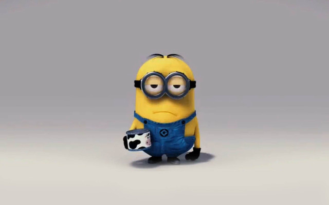 Minion stuffed animal toy holding free wallpaper for desktop - medium preview image