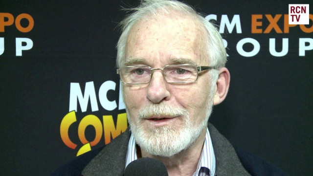 Man beard glasses gray jacket free wallpaper for desktop - medium preview image