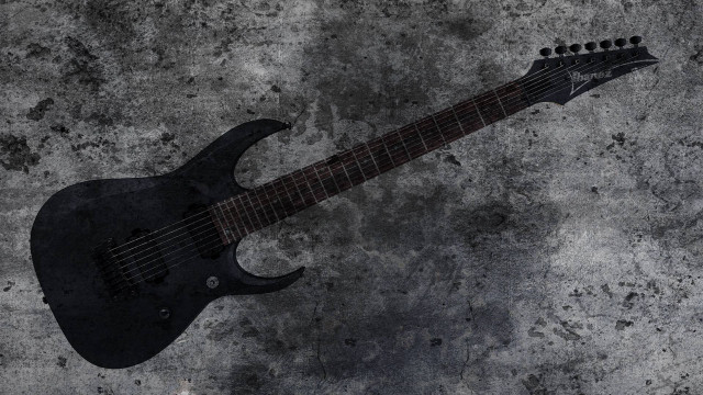 Black guitar gray surface realistic free wallpaper for desktop - medium preview image