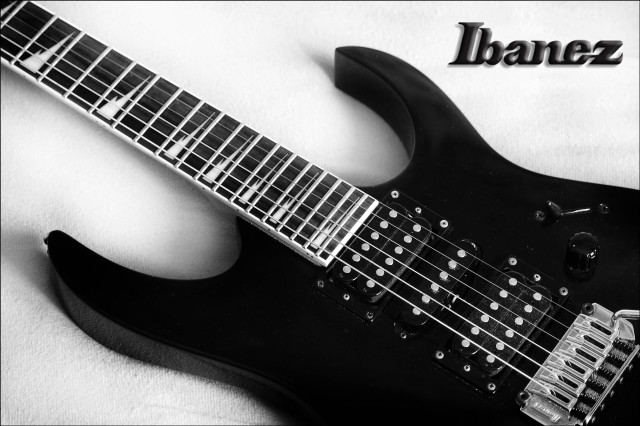 Black guitar white background name free wallpaper for desktop - medium preview image
