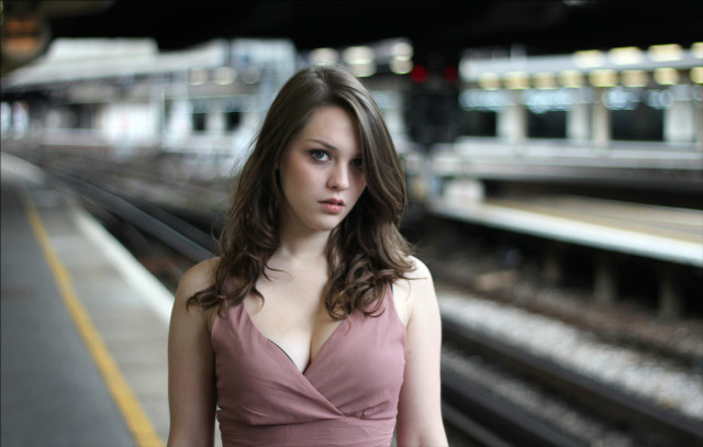 Woman pink dress train station free wallpaper for desktop - medium preview image