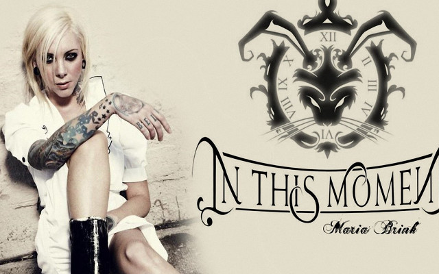 Woman tattoos sitting wall arm free wallpaper for desktop - medium preview image