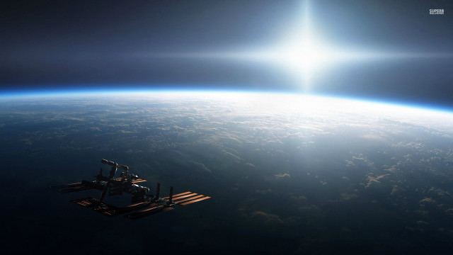 Space station earth sun shining #3 free wallpaper for desktop - medium preview image