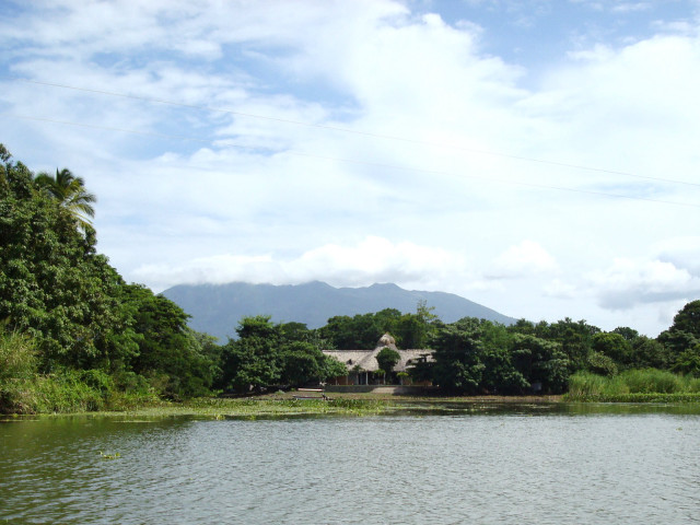 House lake boat mountain shore free wallpaper for desktop - medium preview image