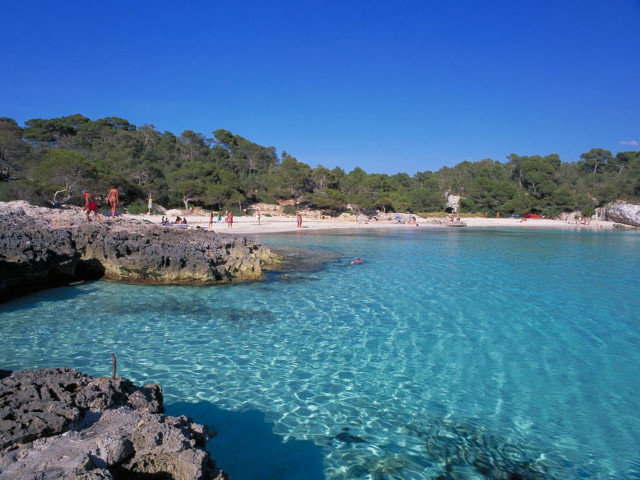 Beach clear blue water people free wallpaper for desktop - medium preview image