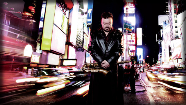 Man city night guitar blurry free wallpaper for desktop - medium preview image