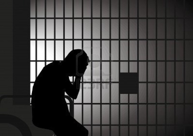 Man sitting jail cell head free wallpaper for desktop - medium preview image