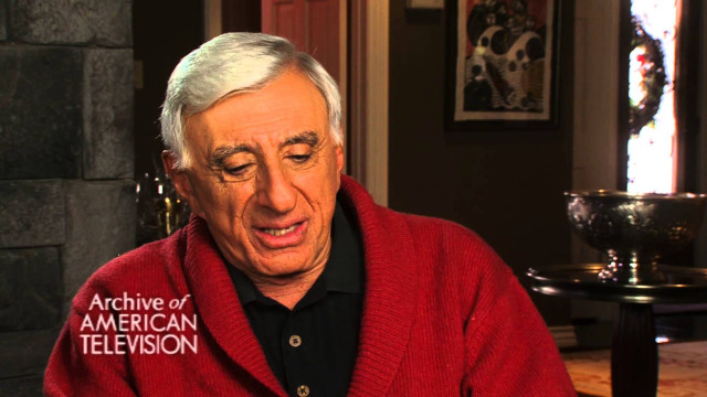 Man red sweater smiling cell free wallpaper for desktop - medium preview image